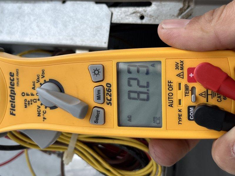 Responded to no cooling complaint on ground-mounted Coleman condensing unit. Upon arrival, confirmed condenser fan motor was inoperative while compressor attempted to run. Performed electrical diagnostics using multimeter, measuring voltage at fan motor terminals and verifying power supply to unit. Testing revealed fan motor failure preventing proper heat rejection from condenser coil. Advised customer of findings and provided repair options to restore cooling operation.