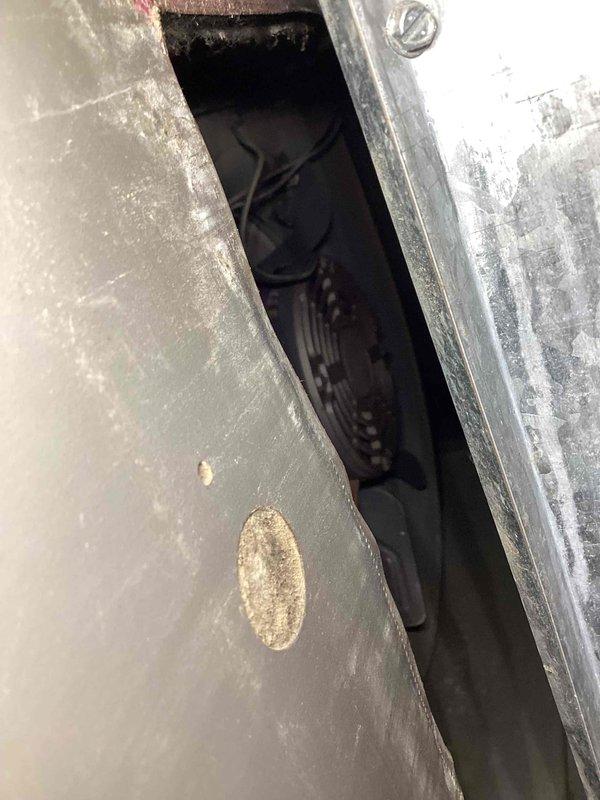 Completed cooling system tune-up on outdoor condenser unit over 10 years old. Performed standard maintenance inspection, noting heavily soiled condenser coil fins with significant debris accumulation and deteriorated condition requiring cleaning attention. Unit operational at time of service with electrical connections and refrigerant lines inspected per maintenance protocol.