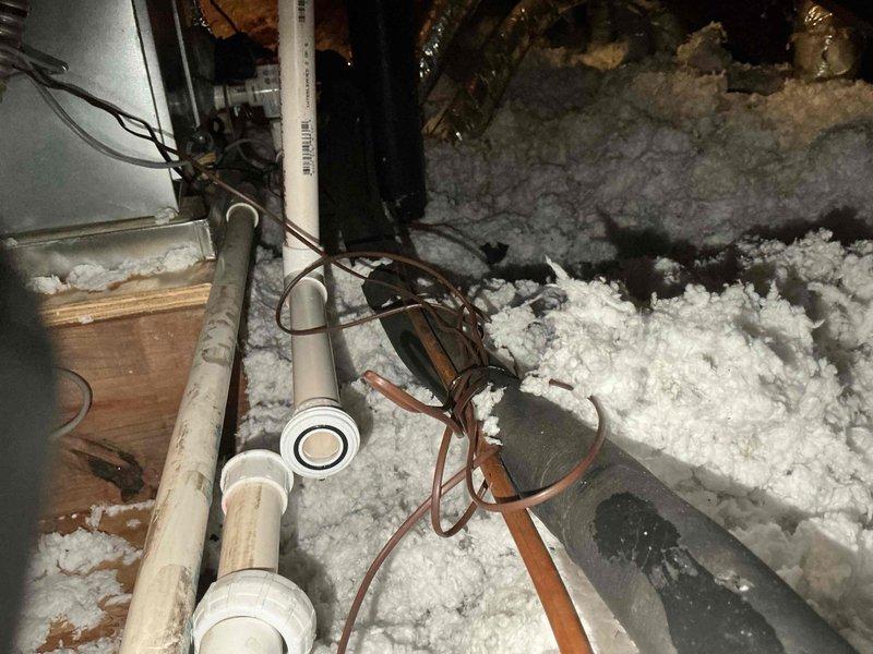 Responded to no-cooling call with Nest thermostat displaying "Error E195 No power to R wire detected" on less than one-year-old system. Upon inspection, found condensate drain pan full and emergency float switch activated, cutting power to R wire as designed to prevent water damage. Cleared condensate line blockage, verified proper drainage, reset float switch, and restored system operation with full power to thermostat.