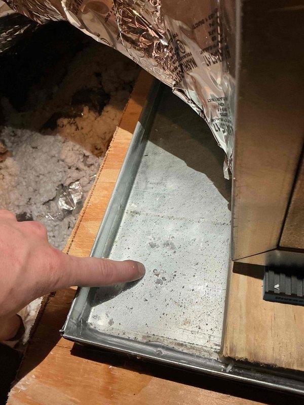 Responded to no-cooling call with Nest thermostat displaying "Error E195 No power to R wire detected" on less than one-year-old system. Upon inspection, found condensate drain pan full and emergency float switch activated, cutting power to R wire as designed to prevent water damage. Cleared condensate line blockage, verified proper drainage, reset float switch, and restored system operation with full power to thermostat.
