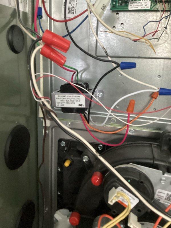 Responded to no-cool call on a 2-year-old system with 2 AC units serving 3 zones. Upon arrival, diagnosed power issue preventing blower fan operation. Installed new White-Rodgers non-programmable digital thermostat and replaced second thermostat per customer request for programmable unit on main floor. Verified all electrical connections at air handler, inspected control board and capacitor wiring. Restored power to system, tested all zones for proper operation, and confirmed cooling cycle engagement across all units.