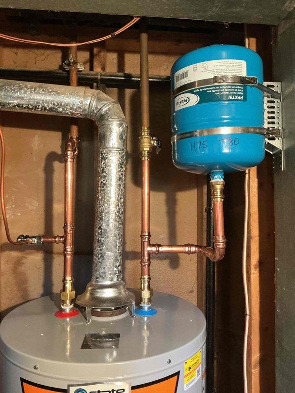 Installed a 40-gallon tall gas water heater to replace the existing unit that was experiencing continuous water discharge from the overflow tube. The new Ruud water heater was professionally installed with proper copper pipe connections, brass fittings, and valves, integrated with the existing blue expansion tank and plumbing system. All connections were soldered, tested for leaks, and verified for proper operation to resolve the overflow issue.