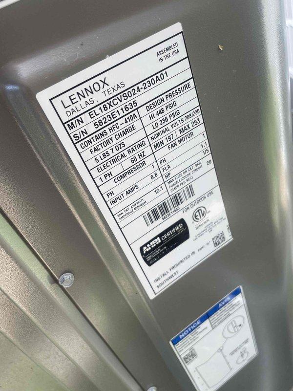 Completed preventative maintenance cooling tune-up on a 2-year-old Lennox EL18XCV524-230A01 air conditioning system containing 7 lbs 13 oz of R-410A refrigerant. System was operating properly upon arrival and remained in good working condition throughout the service. Performed comprehensive inspection of outdoor condenser unit, verified electrical connections, checked refrigerant charge levels, and confirmed all operational parameters were within manufacturer specifications for the 208/230V unit.