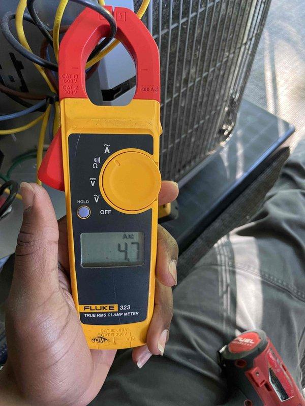 Completed preventive maintenance tune-up on single-zone residential air conditioning system, 0-5 years old, located on balcony. Performed comprehensive system diagnostics including supply air temperature verification at 54.6°F and amperage draw measurement at 43 amps using clamp meter on condenser unit. Inspected condenser coil, verified proper airflow through evaporator, checked electrical connections, and confirmed system operation within manufacturer specifications. Unit found to be functioning properly with no deficiencies noted.