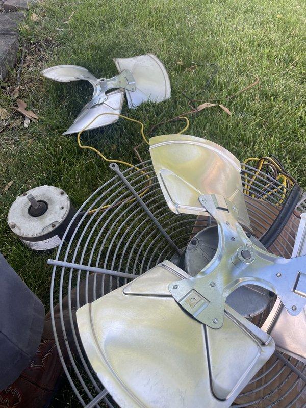 Replaced condenser fan motor, fan blade assembly, and motor run capacitor on outdoor HVAC unit. Removed failed components, installed new motor with matching blade and capacitor, and verified proper operation of system in cooling mode. Unit tested successfully with thermostat responding appropriately to temperature settings.