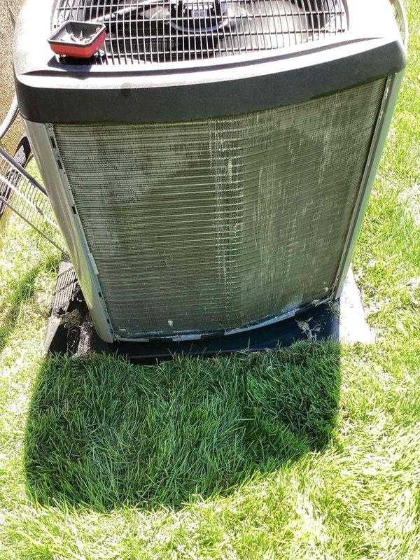 Completed preventive maintenance tune-up on outdoor condensing unit U10 located at side of home. Performed comprehensive system inspection, cleaned condenser coils showing significant dirt and algae buildup on fins, verified electrical connections and amperage readings at 8.54A, and confirmed proper system operation. Unit returned to normal cooling function with all components operating within manufacturer specifications.