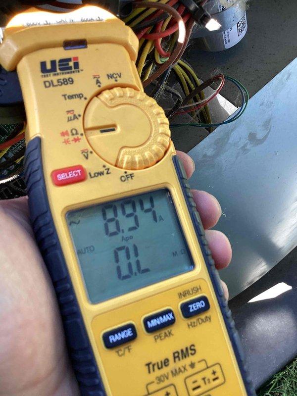 Completed preventive maintenance tune-up on outdoor condensing unit U10 located at side of home. Performed comprehensive system inspection, cleaned condenser coils showing significant dirt and algae buildup on fins, verified electrical connections and amperage readings at 8.54A, and confirmed proper system operation. Unit returned to normal cooling function with all components operating within manufacturer specifications.