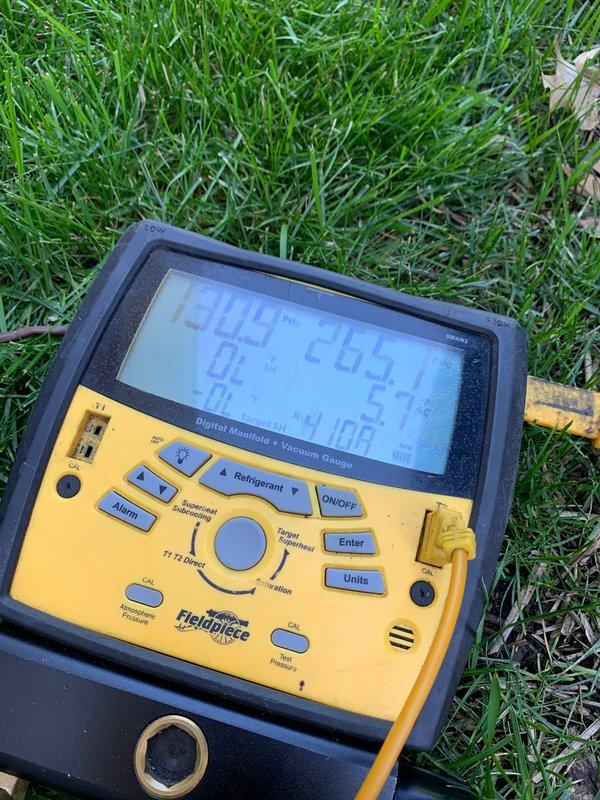 Completed comprehensive AC tune-up on 1-year-old residential unit located in basement. Performed full system inspection including checking refrigerant levels with digital manifold gauge, verifying electrical connections and controls within furnace cabinet, inspecting condensate drainage through PVC piping system, and testing overall system operation. All components found to be functioning properly with no deficiencies noted; unit operating within manufacturer specifications.