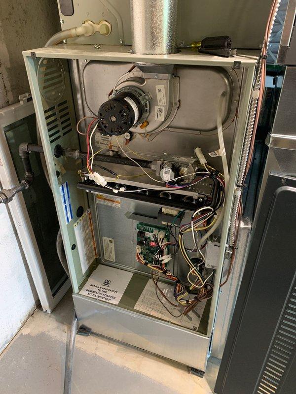 Performed comprehensive cooling system tune-up on residential HVAC unit located in side yard, less than 10 years old. Conducted thorough inspection of furnace interior components including blower motor assembly, electrical connections, burner assembly, and control board. Verified proper operation of all safety switches and electronic controls. Inspected and serviced 20x25x4 pleated air filter, ensuring proper fitment and airflow. Checked refrigerant line connections and insulation integrity. Cleaned accessible components and verified system operational parameters. Unit operating within normal specifications upon completion of preventive maintenance service.