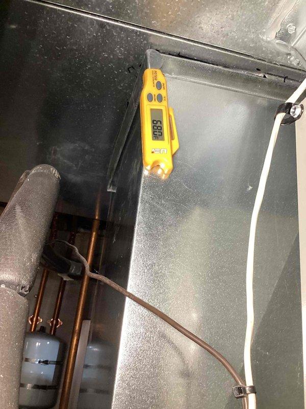 Completed comprehensive cooling system tune-up on 3-year-old outdoor AC unit. Performed electrical diagnostics using digital multimeter to verify proper voltage and amperage readings, measured system temperatures, and inspected all internal components including copper refrigerant lines, insulated suction line, and electrical connections. All measurements fell within manufacturer specifications, and unit showed normal condensation levels indicating proper operation.