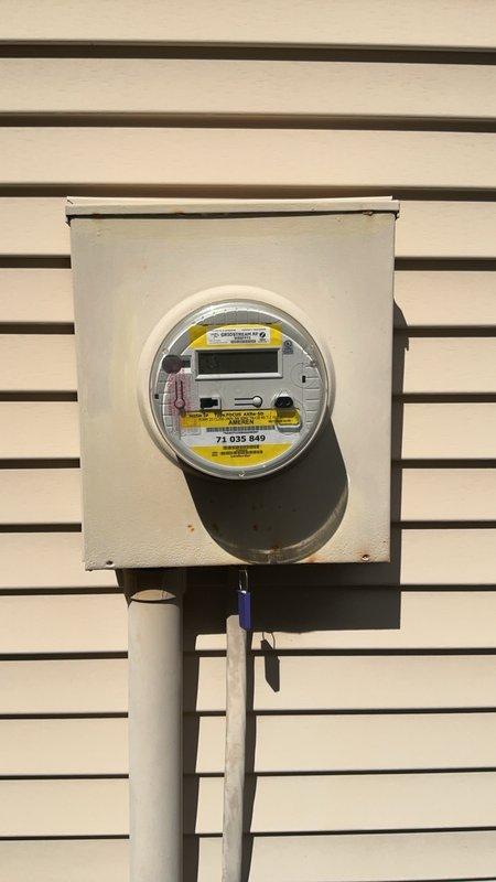 Conducted site evaluation of existing electrical service for panel upgrade estimate. Inspected exterior meter enclosure and interior main distribution panel containing combination breaker and fuse configuration, documenting current system condition with photographs to provide accurate replacement specifications and pricing for outdated fuse-based electrical panel.