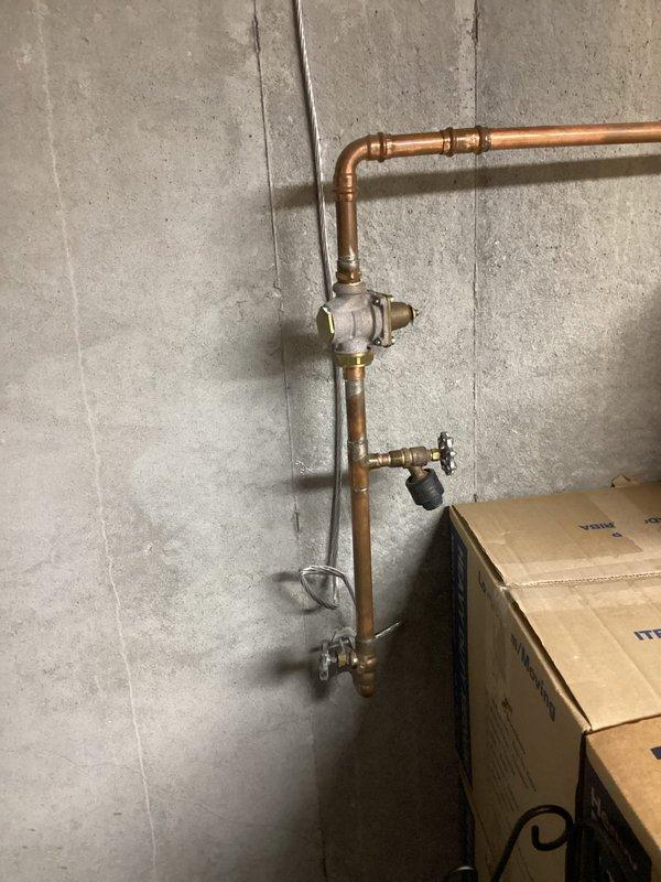 Completed installation of a 50-gallon gas tall water heater with all necessary connections and safety components. Installed a 3/4" ProPress pressure reducing valve to regulate incoming water pressure and protect the new system. All copper supply lines were properly connected using ProPress fittings to ensure leak-free joints, and gas connections were tested for safety compliance.