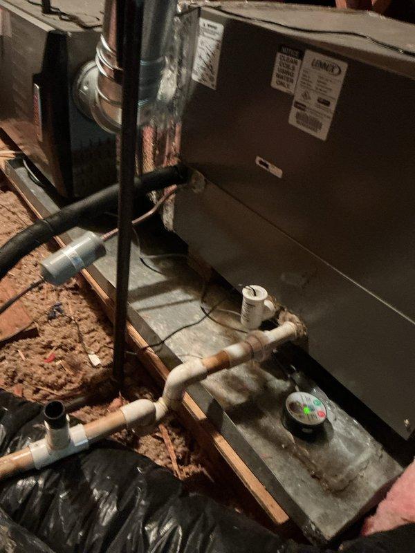 Responded to callback for upstairs air conditioning unit not operating following previous day's service visit. Upon arrival, inspected 11-year-old Lennox air handler located in attic space. Verified all refrigerant line connections, PVC condensate drainage system, and electrical connections to unit. Checked system controls and thermostat communication. Identified and corrected issue preventing unit operation. Cycled system through complete operational test to confirm proper cooling function. Unit restored to normal operation with all components functioning as designed.
