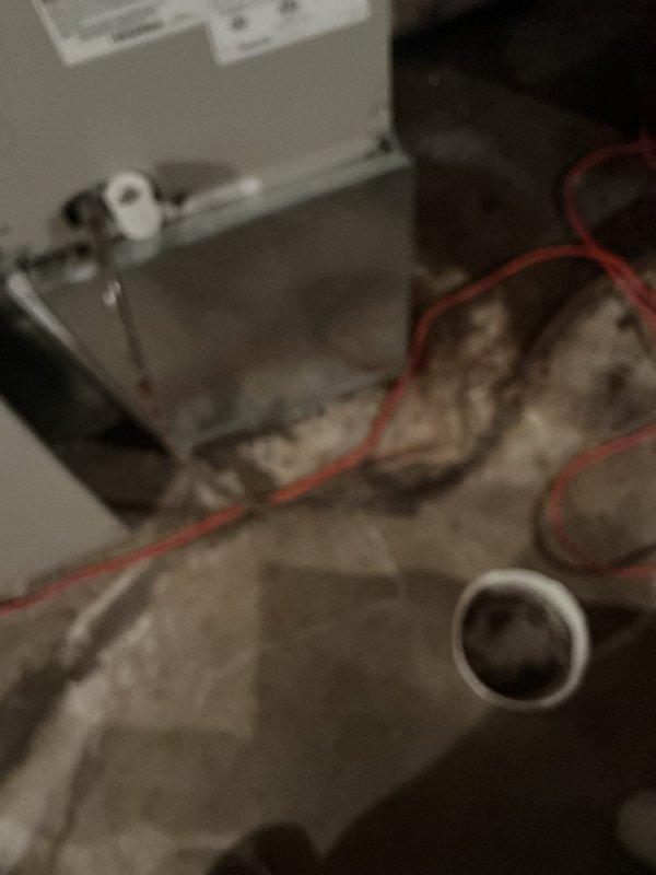 Responded to service call for cooling system issue on 15-year-old air conditioning unit. Upon arrival, performed comprehensive system diagnostic including inspection of air handler, refrigerant lines, and associated components. Evaluated indoor unit installation in mechanical room, checking refrigerant line connections, filter drier, and condensate drainage system for proper operation. Verified electrical connections and assessed overall system performance. Documented equipment condition with photographic records showing air handler cabinet, refrigerant piping with filter drier component, condensate pan placement, and PVC drainage lines. System assessed and customer advised of findings.