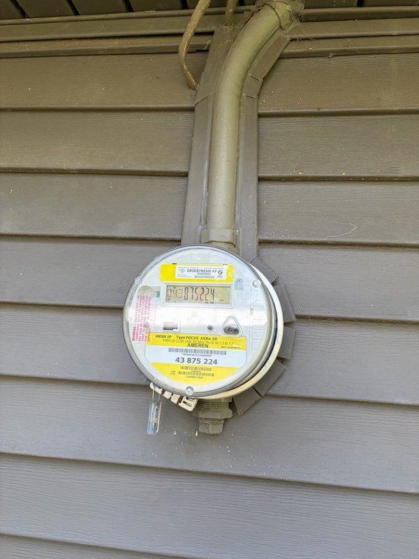 Installed dedicated electrical circuit for new HVAC system, running 8-12 gauge wiring approximately 25-30 feet through attic space to exterior meter location. Routed gray electrical conduit from meter housing along exterior siding, securing all connections per code requirements. Verified proper meter integration and completed installation with all components functioning correctly.