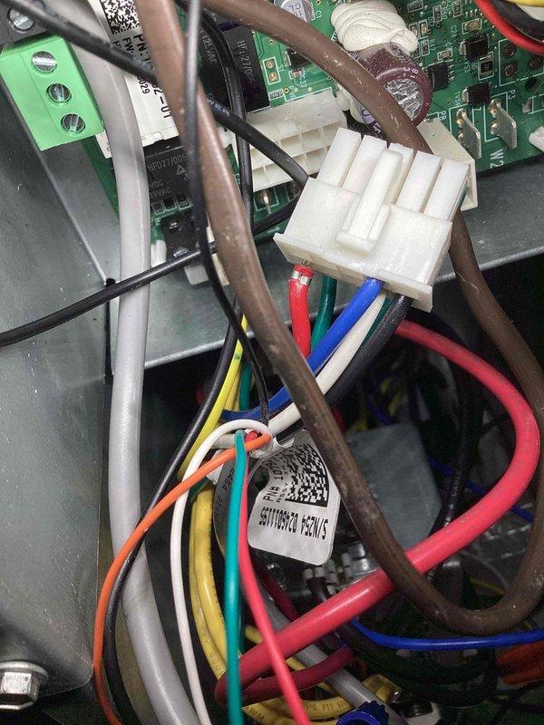 Responded to no-cooling call on unit U10 located at side of home. Customer reported thermostat disconnect the previous day with unit failing to operate even after thermostat was reconnected. Upon arrival, performed diagnostic inspection of control board and wiring connections. Inspected circuit board components, wiring harnesses, and multi-pin connectors for signs of failure or loose connections. Verified proper wire terminations at control board terminals and checked for damaged components. Photographed internal control board assembly and wiring configuration for documentation purposes. System evaluated and necessary repairs completed to restore proper operation.