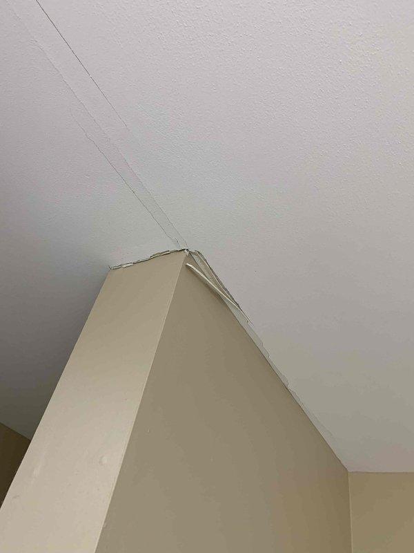 Responded to service call for ductwork sweating and water issues on 2-year-old system in basement. Upon inspection, identified condensation forming on supply ducts due to inadequate insulation and high humidity levels in conditioned space. Observed water staining on ceiling surfaces near ductwork, confirming ongoing moisture accumulation. Verified system operation and airflow parameters were within manufacturer specifications, confirming issue was environmental rather than equipment malfunction.