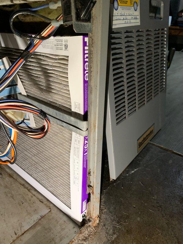 Completed comprehensive tune-up service on residential air conditioning system per Home Depot work order F58609720. Performed full system inspection of single outdoor condensing unit and indoor air handler/furnace assembly located in basement utility area. Evaluated blower motor assembly, electrical connections, and refrigerant line set with black insulation sleeves. Noted Filtrete air filters showing moderate dust accumulation at air handler intake. Verified all ductwork connections including white flexible ducting and metal supply plenum with reflective insulation. Confirmed proper operation of all HVAC components and documented system condition with photographs. Unit operational and ready for cooling season.