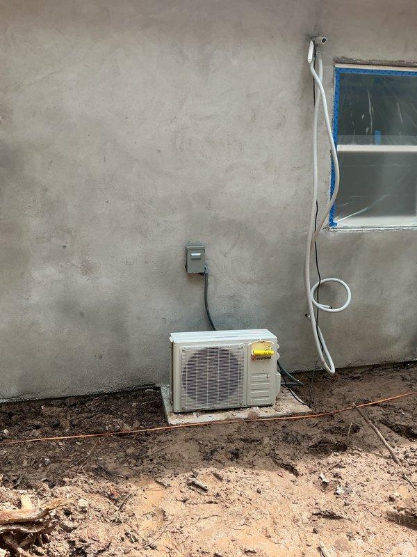 Responded to no cooling complaint on multiple mini-split systems following previous contractor's incomplete work. Performed diagnostic evaluation on four mini-split units including outdoor Daikin inverter condensers and associated indoor air handlers. Inspected refrigerant line sets, electrical connections, condensate drainage, and control wiring on all units to identify installation deficiencies and operational failures. Documented existing conditions with photographic evidence showing outdoor equipment placement, electrical disconnects, and refrigerant piping installation. Assessed system performance issues and provided recommendations for necessary repairs to restore proper cooling operation to all affected zones.