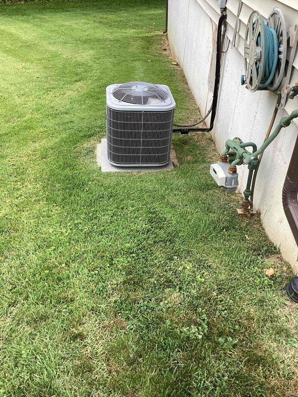 Responded to callback for indoor humidity complaint on residential split system less than 10 years old. Upon arrival, connected manifold gauges and performed refrigerant pressure analysis on outdoor condensing unit. System diagnostics revealed operating parameters requiring adjustment. Added refrigerant charge from Arctic Eagle cylinder to bring system pressures within manufacturer specifications. Verified proper airflow across condenser coil and confirmed all electrical connections secure at disconnect. Monitored system operation through complete cooling cycle to ensure adequate dehumidification and temperature control restored to occupied space.
