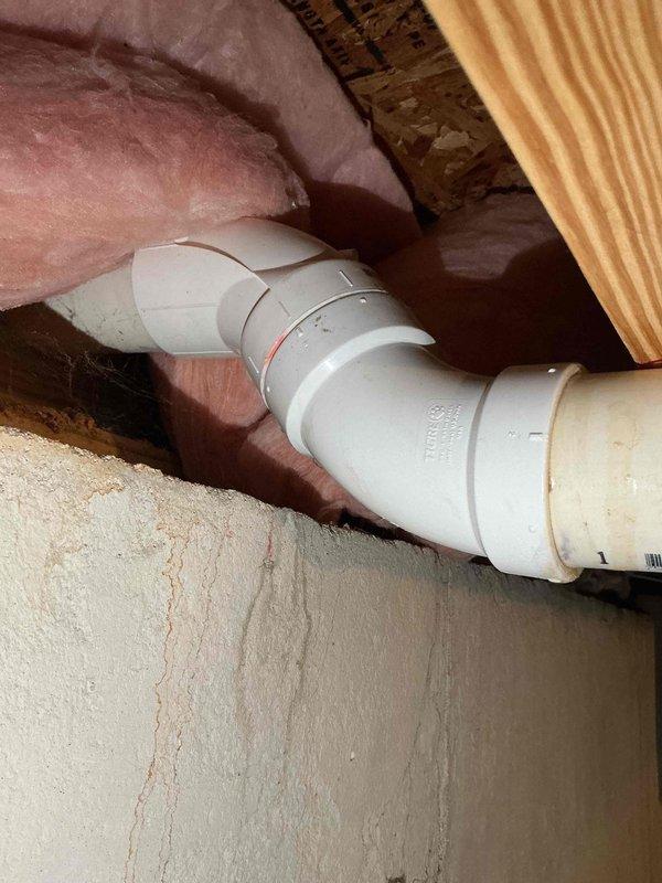Responded to recall for detached PVC pipe from basement furnace unit. Upon inspection, found exhaust flue pipe separation at elbow joint near basement ceiling joists. Replaced compromised exhaust PVC piping with approximately 30 feet of 2-inch PVC pipe and fittings, ensuring proper venting and secure connections throughout the run. Verified all exhaust pipe connections are properly sealed and supported. Confirmed existing intake pipe remains serviceable and can be reused. System tested and operating within manufacturer specifications.