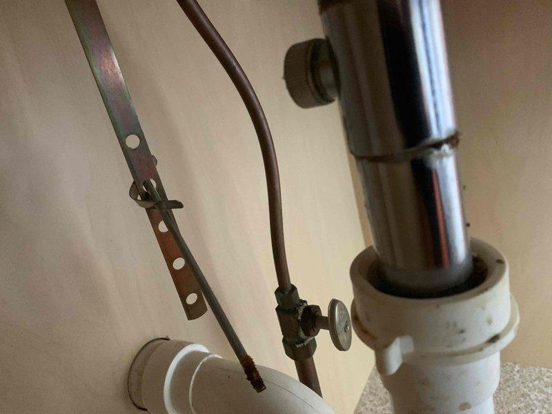 Responded to service call for slow-draining bathroom sink and clogged kitchen double sink. Upon inspection, discovered significant accumulation of hair and organic debris in bathroom sink drain, causing restricted water flow. Removed drain stopper assembly and manually extracted blockage material from P-trap area. In kitchen, assessed double sink configuration and cleared complete obstruction using appropriate drain cleaning methods. Verified proper drainage flow restored to both fixtures. All plumbing components inspected and confirmed to be functioning correctly upon completion.