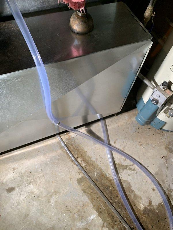 Returned to property to replace 25 feet of deteriorated condensate drain hose on HVAC unit. Removed old damaged drain line, installed new drain hose from truck stock, and verified proper drainage operation. System tested and confirmed operational for both heating and cooling functions.