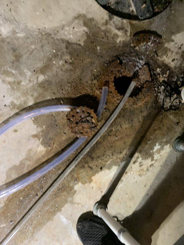 Returned to property to replace 25 feet of deteriorated condensate drain hose on HVAC unit. Removed old damaged drain line, installed new drain hose from truck stock, and verified proper drainage operation. System tested and confirmed operational for both heating and cooling functions.
