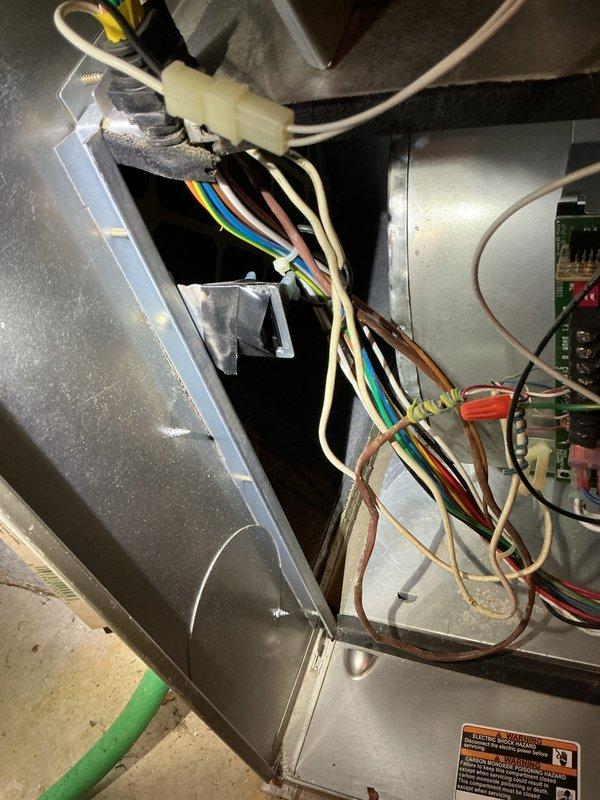 Responded to no-power complaint on 13-year-old Carrier system affecting entire home. Upon arrival, confirmed no power to indoor unit, thermostat, or any system components. Accessed air handler and inspected electrical connections, circuit board, and control wiring. Found loose wire connection at control board that had worked free, causing complete loss of power to system. Secured all wire connections, verified proper voltage at transformer and control circuits, and restored power to unit. Cycled system through complete heating and cooling operations to confirm proper function. All components operating normally at time of departure.