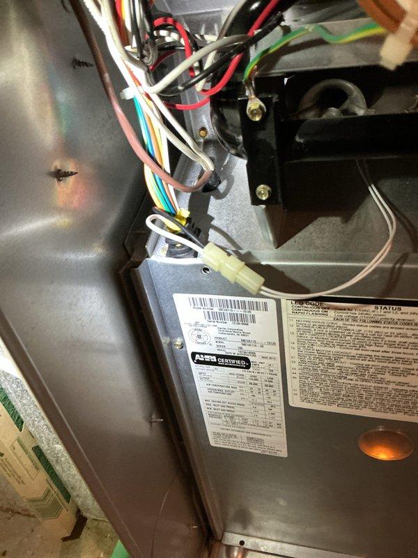 Responded to no-power complaint on 13-year-old Carrier system affecting entire home. Upon arrival, confirmed no power to indoor unit, thermostat, or any system components. Accessed air handler and inspected electrical connections, circuit board, and control wiring. Found loose wire connection at control board that had worked free, causing complete loss of power to system. Secured all wire connections, verified proper voltage at transformer and control circuits, and restored power to unit. Cycled system through complete heating and cooling operations to confirm proper function. All components operating normally at time of departure.