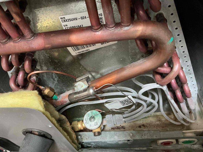 Responded to no-cool complaint on approximately 10-year-old residential air conditioning system affecting entire home. Upon arrival, performed diagnostic evaluation of Lennox system with CBC25UHV-024 condenser unit. Inspected refrigerant lines, electrical connections, and internal components. Identified service issue and completed necessary repairs to restore cooling function. Verified proper system operation, checked airflow at return air grille, and confirmed unit cycling correctly. System returned to normal operating condition with full cooling capacity restored to residence.