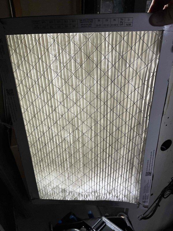 Responded to callback for AC unit not blowing cold air following recent installation. Upon arrival, replaced dirty air filters that were restricting airflow and impacting system performance. Installation included nonprogrammable thermostat, new condenser pad, electrical disconnect, and whip connection. System inspected and confirmed operational after filter replacement, with proper airflow restored throughout the system.
