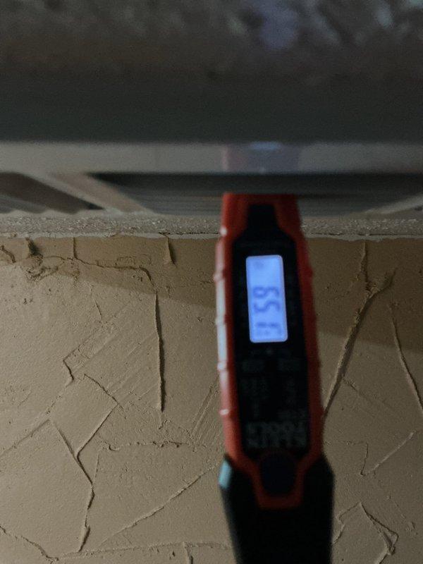 Responded to no cooling complaint on 2014 system with reported frozen evaporator coil. Upon arrival, found unit powered off with fan running as instructed. Performed system diagnostics including temperature readings at supply registers and visual inspection of indoor air handler components. Inspected blower wheel assembly and verified proper operation of centrifugal fan, noting age-related patina and discoloration on housing but confirming blades remained intact and functional. Assessed airflow conditions and checked for potential restrictions that could contribute to coil freezing. Evaluated system for refrigerant leak as reported by customer and documented equipment condition with thermal imaging and component photography for service records.