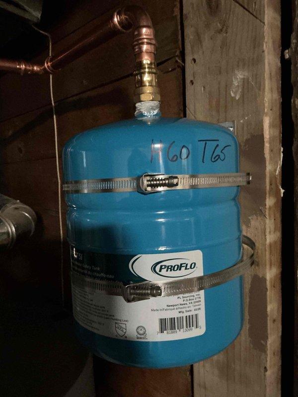 Completed installation of 40-gallon gas water heater with 3/4" pressure reducing valve in accordance with City of University permit #26-006396. Installed State brand water heater unit with proper copper piping connections, brass fittings, and pressure relief valve. Integrated Proflo brand expansion tank mounted between wall studs with metal hose clamps and connected to system via copper piping. All connections tested and verified operational upon completion.