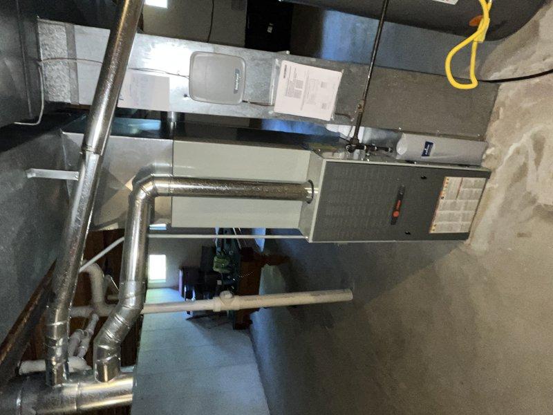 # HVAC Service - No Cool Diagnostic

Responded to service call for 8-year-old air handler system located in basement with reported issues of warm air discharge, inadequate temperature maintenance, and excessive operational noise. Upon arrival, customer had system running in fan-only mode with cooling disabled per pre-service instructions.

Performed comprehensive diagnostic evaluation of the air handling unit and associated ductwork. Conducted visual inspection of the entire HVAC installation including the air handler cabinet, supply plenum connections, and metallic ductwork configuration. Examined control panel indicators and operational status lights on unit front panel. Assessed humidifier integration and connection points to main supply duct.

Evaluated airflow characteristics through supply grilles and return air pathways. Inspected ductwork joints, elbow connections, and insulation integrity throughout the distribution system. Checked for proper clearances around equipment and ve