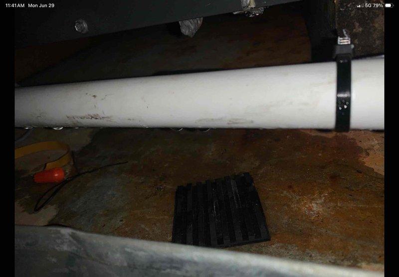 Responded to service call for intermittent unit shutdown due to moisture sensor alerts in drain pan on recently installed system. Accessed crawlspace air handler with ladder and inspected condensate drain system and safety float switch. Verified control board connections and sensor wiring at air handler control panel. Brought replacement backup sensor as requested and completed system diagnostic to resolve false moisture detection causing premature shutdowns.