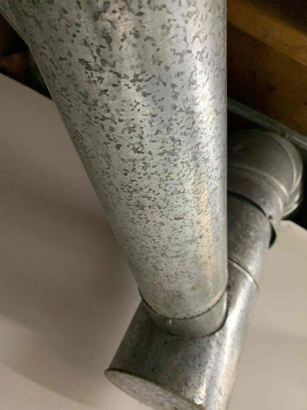 Responded to no cooling complaint on 5-year-old residential air conditioning system. Upon arrival, performed diagnostic evaluation of outdoor condensing unit and indoor air handler components. Inspected electrical connections, refrigerant lines, and ductwork system throughout basement mechanical room. Verified proper operation of furnace and associated HVAC equipment. System restored to normal cooling operation with all components functioning within manufacturer specifications.