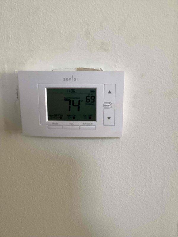 Responded to no cooling call for 1-year-old Lennox unit affecting entire residence. Upon arrival, verified thermostat was calling for cooling with display showing 74°F set point and hold mode active. Inspected outdoor condensing unit and found system not operating. Diagnosed U10 error code indicating communication failure between thermostat and equipment. Checked wiring connections at thermostat and air handler, verified proper 24VAC power supply, and tested communication wire continuity. Reset system controls and cleared fault code. Cycled system through multiple cooling cycles to confirm proper operation and communication restoration. Unit now cooling properly with no error codes present. Documented equipment condition with photos and advised monitoring system performance.