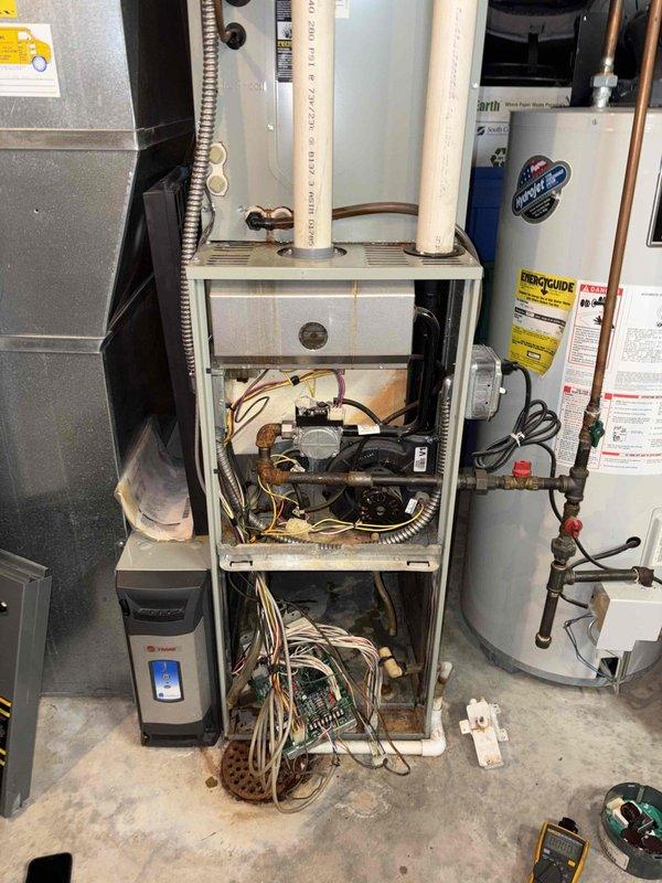 # HVAC Service - No Cool 10+

Responded to no cooling call where outdoor unit was running but indoor blower failed to engage. Upon arrival, performed diagnostic testing on the blower motor assembly located in the basement air handler system. Using multimeter, confirmed blower motor had failed electrically and was preventing air circulation through the system. Removed and disassembled blower assembly housing to access the motor. Replaced defective blower motor with new unit, reassembled blower housing, and reinstalled into air handler. Verified proper electrical connections, tested motor operation across all speed taps, and confirmed adequate airflow through the system. Cycled system through complete cooling operation to ensure outdoor unit and indoor blower now functioning in proper sequence. System restored to normal cooling operation with no further issues detected.