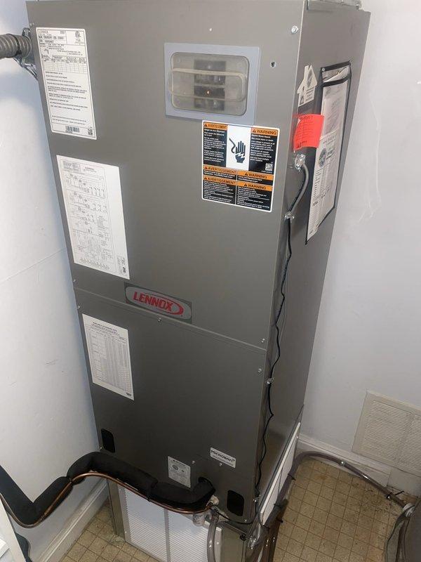 Responded to no cooling complaint on Lennox air handler system. Upon arrival, confirmed loss of cooling throughout home as of previous day. Inspection revealed severe ice buildup on suction line (copper refrigerant piping), indicating restricted airflow or low refrigerant charge. Photographically documented frozen evaporator coil and icing on refrigerant lines at air handler. Checked air filter condition and verified system operation. Diagnosed issue as either dirty/restricted evaporator coil, low airflow across coil, or potential refrigerant leak causing coil to freeze. System requires defrost cycle completion, thorough airflow assessment, and refrigerant charge verification to restore proper cooling operation.