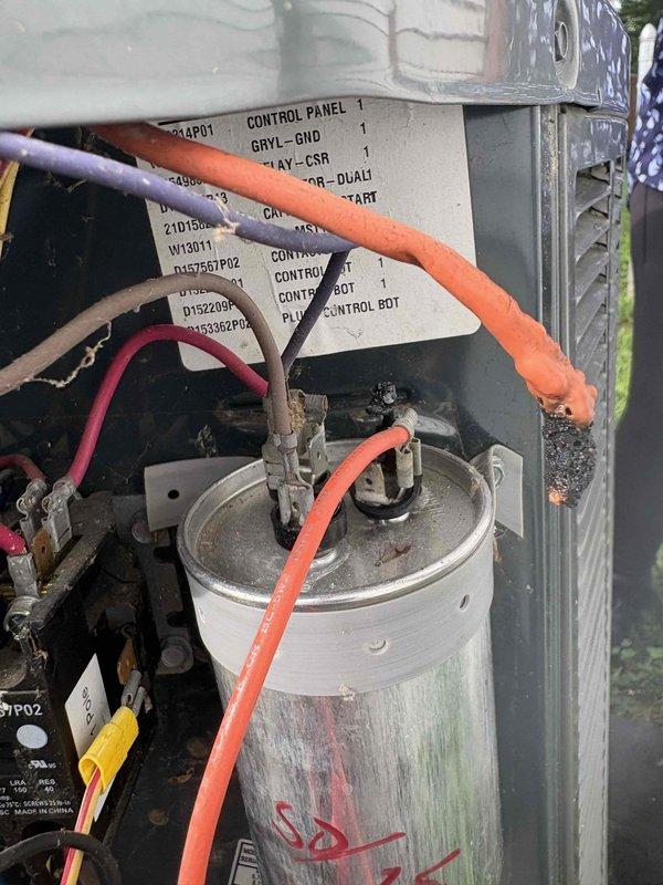 Responded to callback for cooling system not maintaining set temperature on 10+ year old unit located in side yard. Upon inspection, found heavily corroded capacitor terminal with significant rust buildup and oxidation, compromising electrical connection and system performance. Replaced failed capacitor and verified proper electrical connections. System tested and confirmed cooling to setpoint with normal amperage draw and temperature differential across coil.