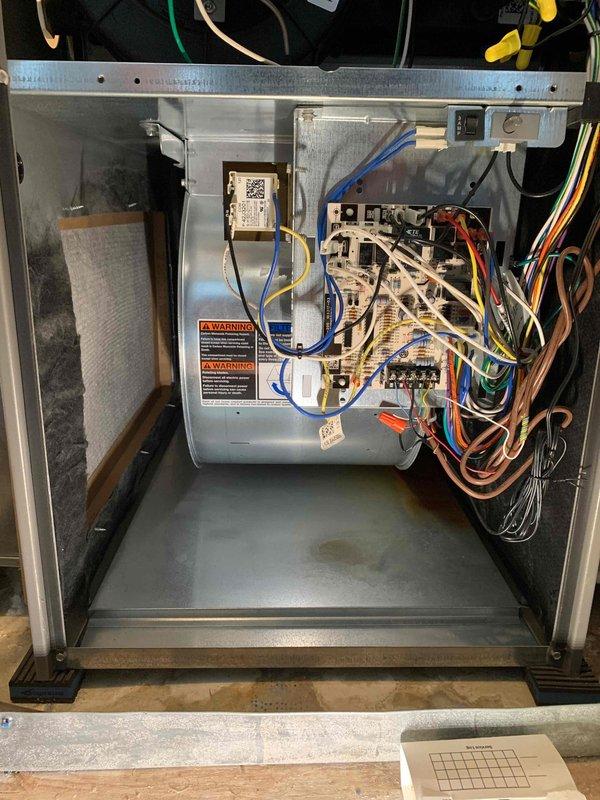 Completed cooling system tune-up on a Payne air conditioning unit over 10 years old located in side yard. Performed comprehensive inspection of outdoor condenser unit and indoor air handler components, checked all electrical connections and control board operations, cleaned debris from condenser coil and top grille, verified proper refrigerant levels, and tested system performance to ensure optimal cooling efficiency for the season.