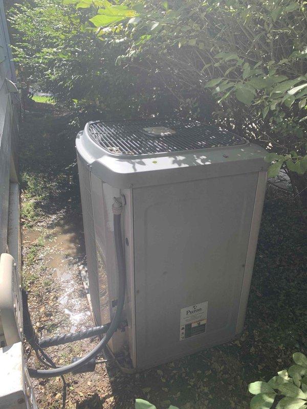 Completed cooling system tune-up on a Payne air conditioning unit over 10 years old located in side yard. Performed comprehensive inspection of outdoor condenser unit and indoor air handler components, checked all electrical connections and control board operations, cleaned debris from condenser coil and top grille, verified proper refrigerant levels, and tested system performance to ensure optimal cooling efficiency for the season.