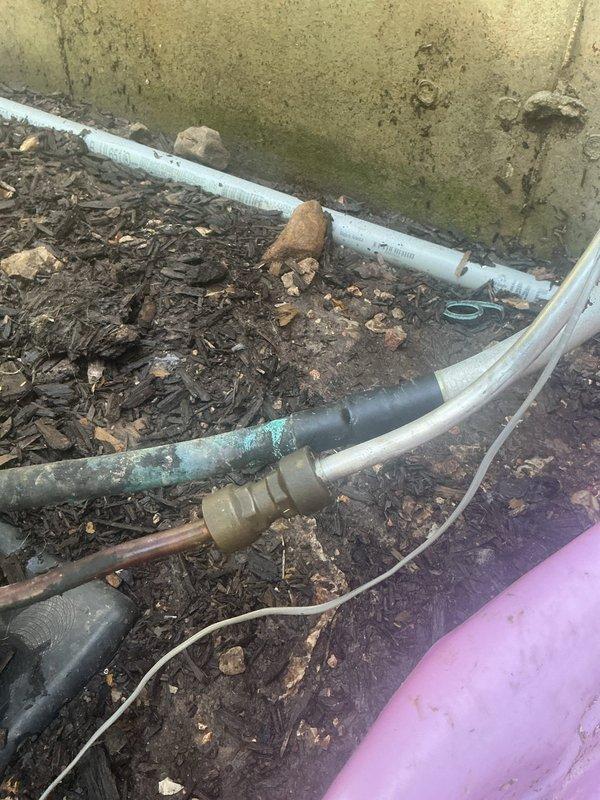 Returned to property to diagnose HVAC unit as scheduled. Upon inspection, observed significant corrosion and green oxidation on brass coupling fittings connected to refrigerant lines at exterior unit location. Documented condition of piping components showing weathering and deterioration at ground-level connections. No repairs performed during this diagnostic visit per service agreement terms.