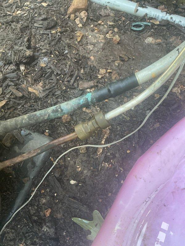 Returned to property to diagnose HVAC unit as scheduled. Upon inspection, observed significant corrosion and green oxidation on brass coupling fittings connected to refrigerant lines at exterior unit location. Documented condition of piping components showing weathering and deterioration at ground-level connections. No repairs performed during this diagnostic visit per service agreement terms.