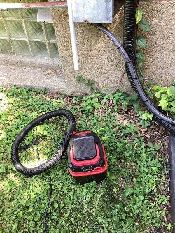 Responded to no cooling call for attic-mounted AC unit. Upon inspection, advised customer to shut AC unit off and leave fan running to prevent further system damage. Documented outdoor condensing unit and equipment setup for service records.