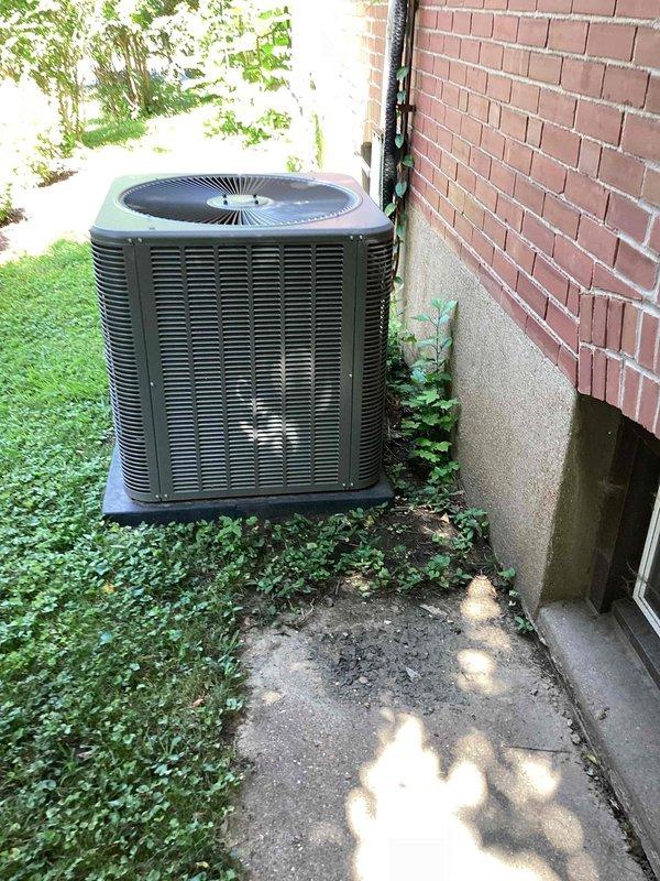 Responded to no cooling call for attic-mounted AC unit. Upon inspection, advised customer to shut AC unit off and leave fan running to prevent further system damage. Documented outdoor condensing unit and equipment setup for service records.