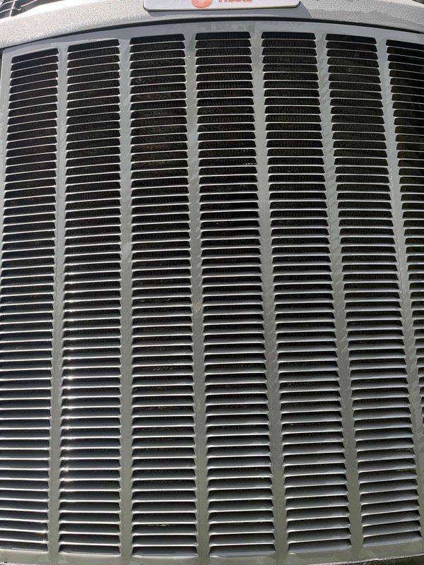 Completed cooling tune-up on outdoor condenser unit over 10 years old located in side yard. Performed comprehensive system inspection, cleaned condenser coils, checked refrigerant levels, tested electrical connections and controls, and verified proper operation of all components. Unit found in good working condition with no immediate repairs needed.