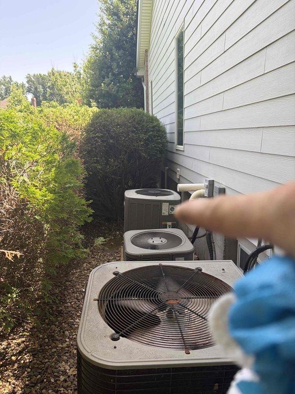 Responded to service call for inadequate cooling in master bedroom zone. Upon arrival, inspected multiple outdoor condenser units including Lennox CX34-30A-6F heat pump system. Instructed occupant to power down affected unit and operate fan only mode to prevent potential compressor damage while troubleshooting cooling issue.
