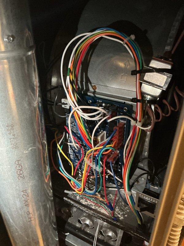 Completed comprehensive cooling system tune-up on 6-year-old outdoor AC unit. Inspected and documented air filter condition showing moderate dust accumulation in pleats, examined electrical control boards and wiring connections, and verified all system components for proper operation. Unit tested and confirmed operational within manufacturer specifications.